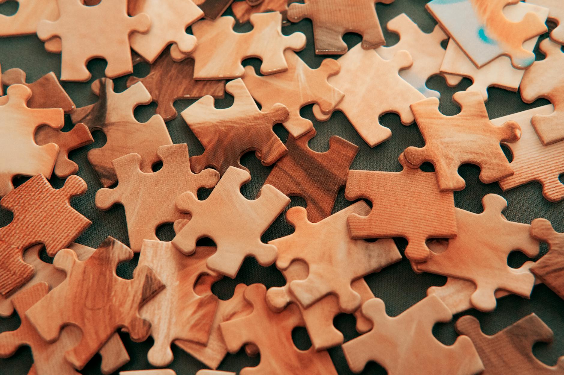 A picture of jigsaw puzzles scattered about